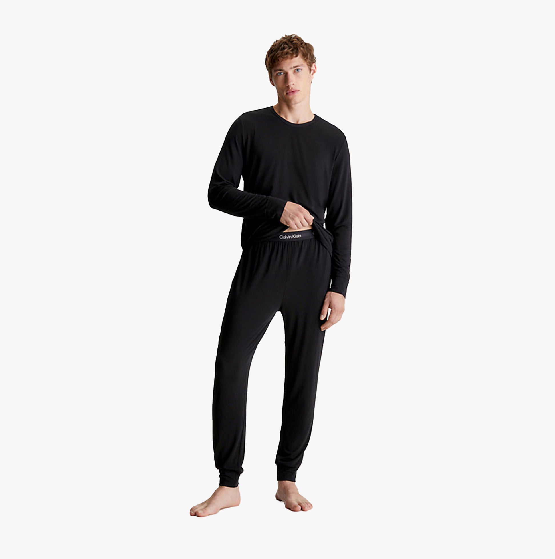 CalvinKlein-[000NM2235AUB1]-BLACK-1.jpg